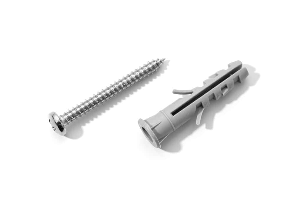 Expansion screws 2 Plastic dowel and screw isolated on a white background