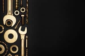 High-quality alloy steel screws and bolts displayed on a dark background, showcasing durability and strength for industrial applications.